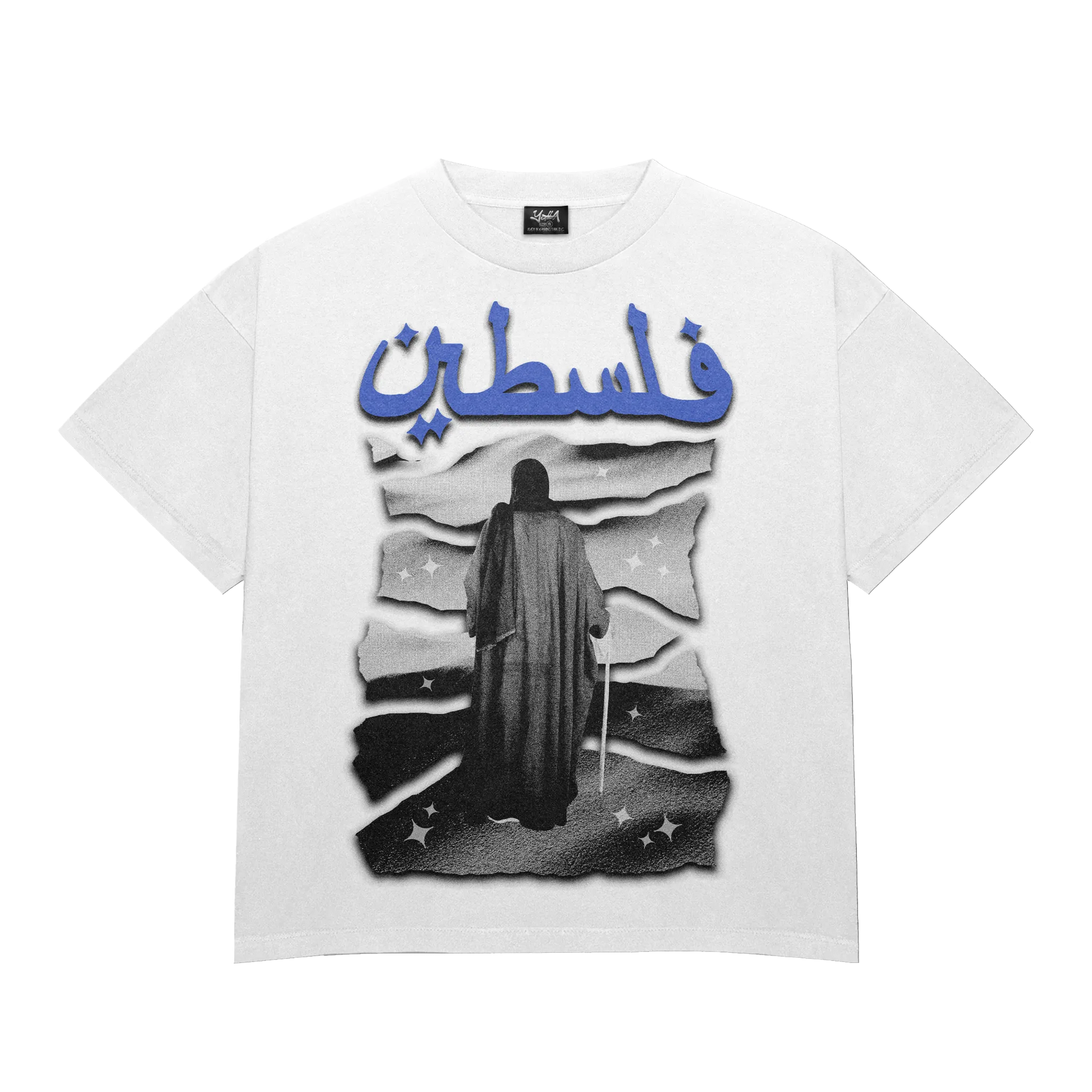 Snow Palestine Graphic Tee featuring "فلسطين" (Palestine) in bold blue Arabic text, set against a desert-inspired background. A statement piece in Arab streetwear with high-quality breathable cotton.