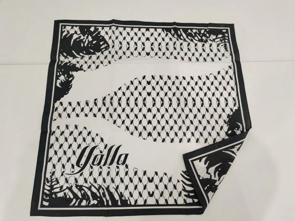 Black and white patterned Kufiya Bandana with 'Yalla' branding on a white background